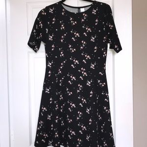 Black floral patterned skater dress